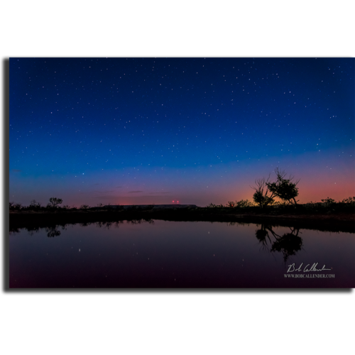 Stars and water glisten at sunset in the image Starry Night by Bob Callender.