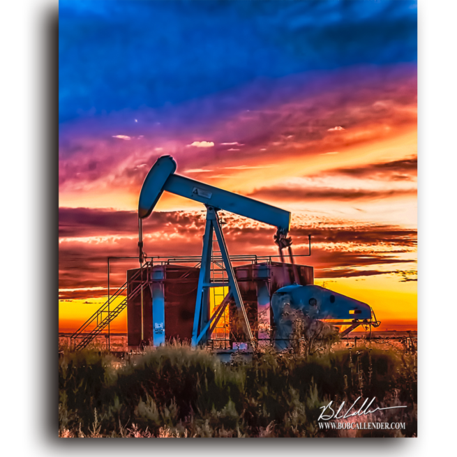 As the sun sets on a pump jack the colors are amazing. End of the Day by Bob Callender
