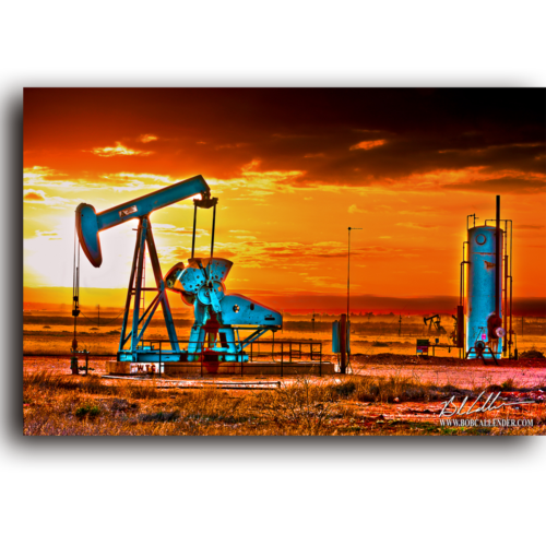 Vibrant sunsent on a blue pump jack. Jewels of the Basin by Bob Callender