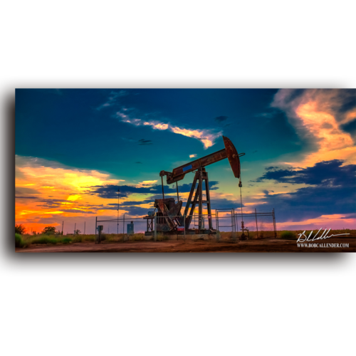 A pastel sunset and pump jack against a blue sky. Placidity by Bob Callender