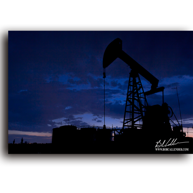 A pump jack against the night sky in this photo Standing Tall by Bob Callender.