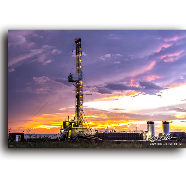 A rig at sunset in front of a lavender sky. Savannah Sky by Bob Callender