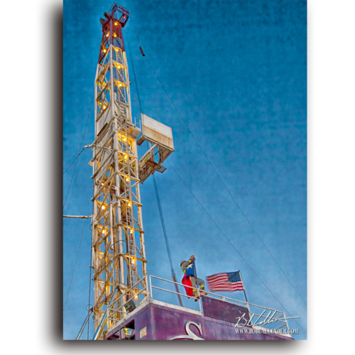 Patriotic flags wave on a rig in the photo Texas Oil by Bob Callender